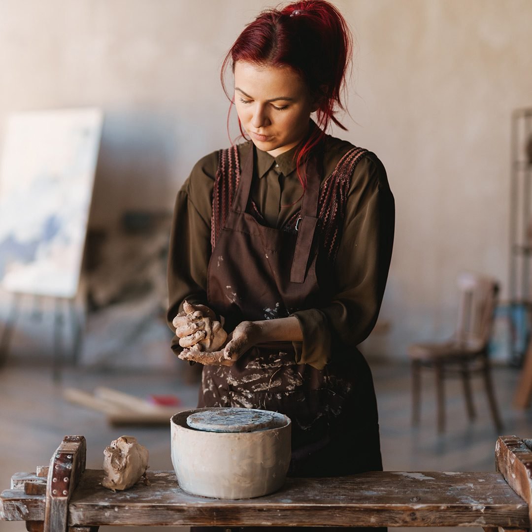 young-woman-sculptor-artist-creating-a-bust-sculpt.jpg